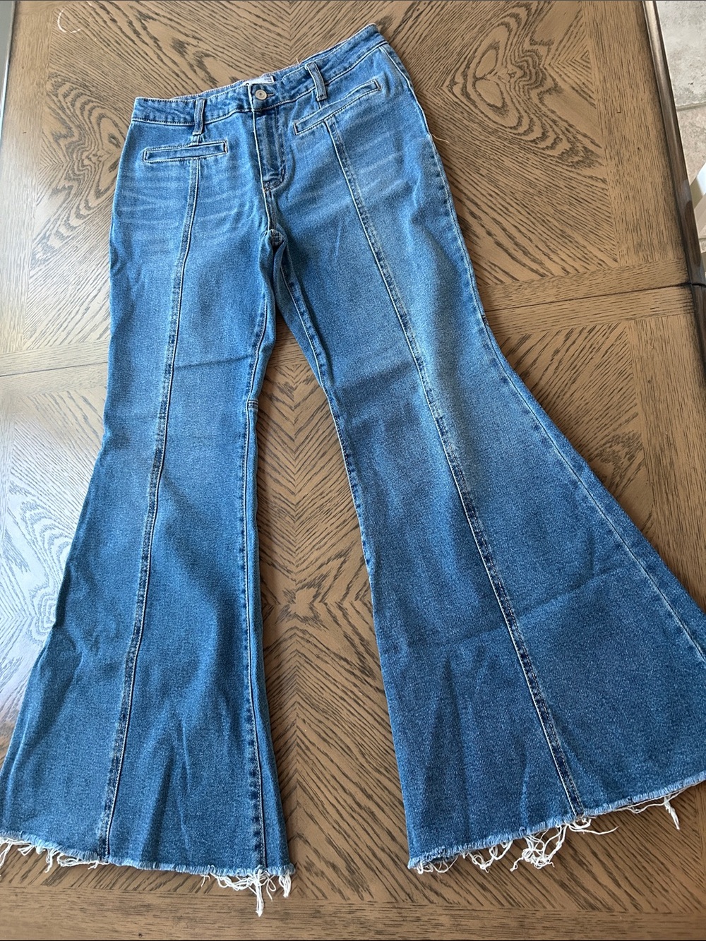 High-Rise Medium Blue Flare Jeans with Panel Seams